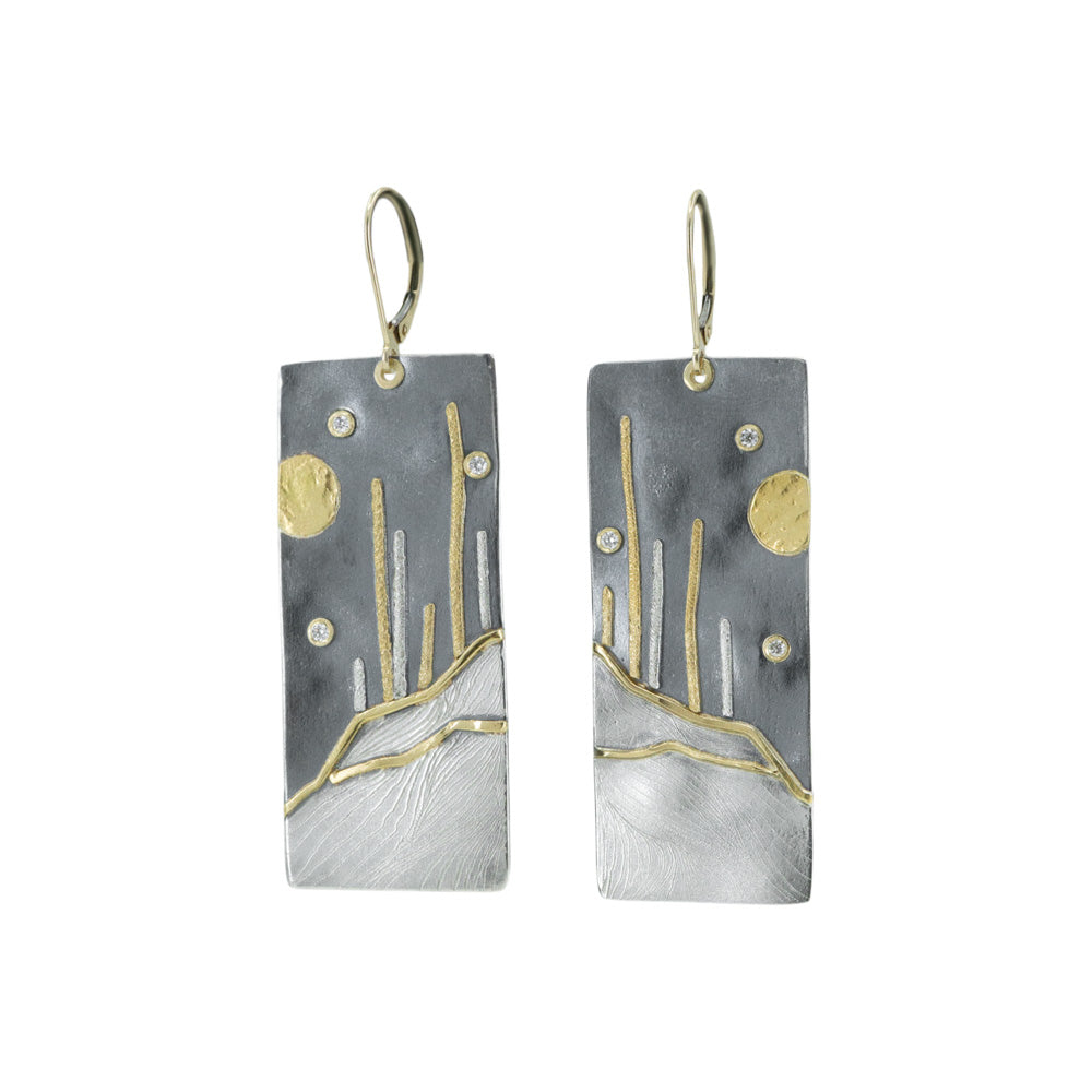 Mixed metal dangle earrings with desert motif and diamond accents by Erin Cuff Jewelry.
