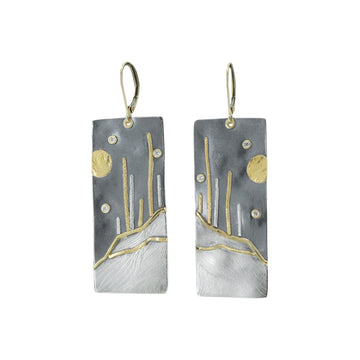 Mixed metal dangle earrings with desert motif and diamond accents by Erin Cuff Jewelry.