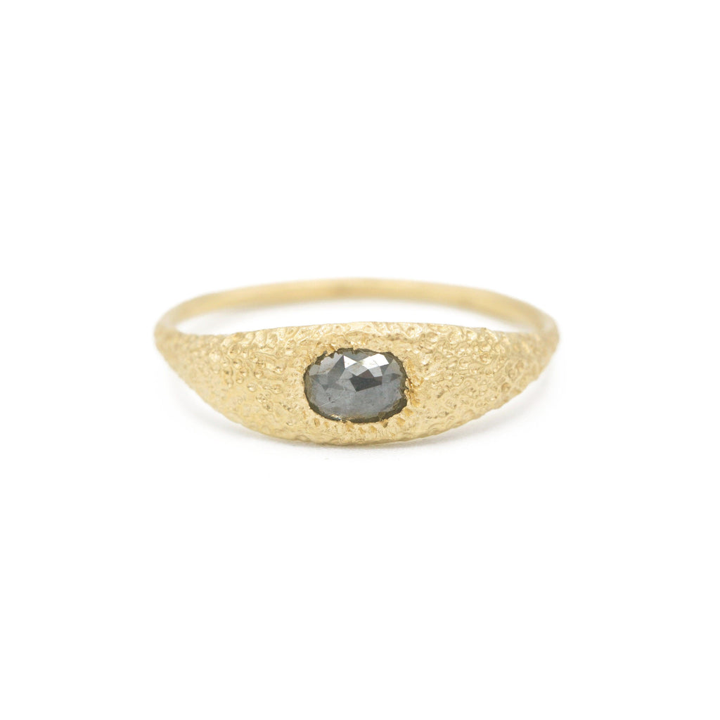 Desert Oasis Solitaire in 18k yellow gold with a salt + pepper diamond by Erin Cuff Jewelry.