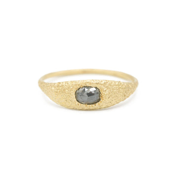 Desert Oasis Solitaire in 18k yellow gold with a salt + pepper diamond by Erin Cuff Jewelry.